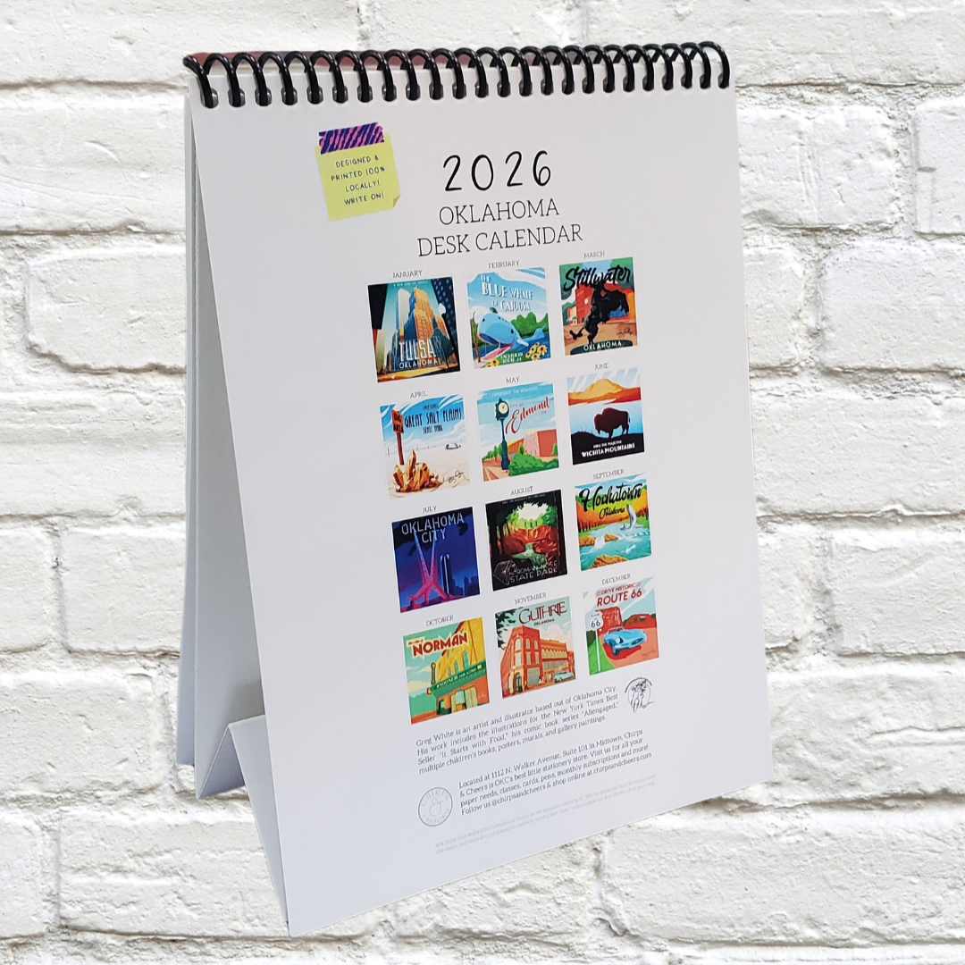 2026 Oklahoma desk calendar on a white brick wall