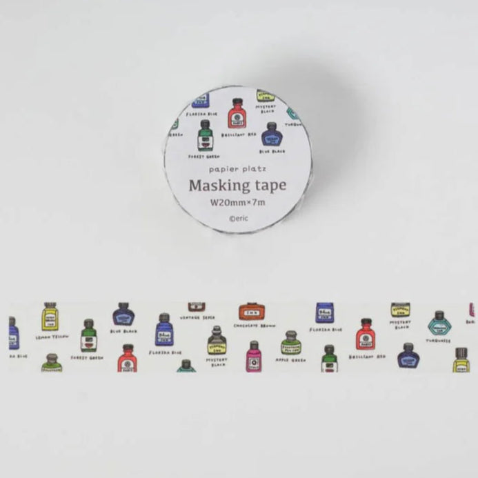 Masking tape roll with colorful labels on a white background