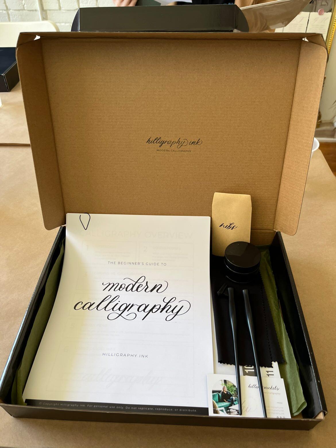 Calligraphy set with book and tools in a box