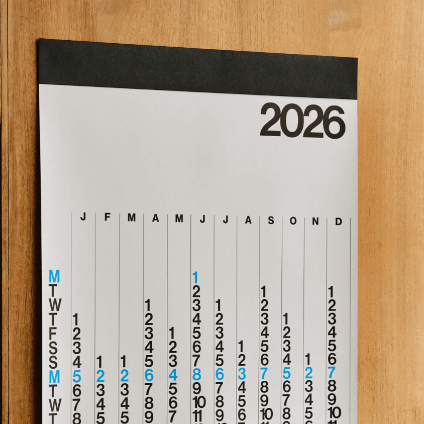 Calendar for the year 2026 on a wooden surface