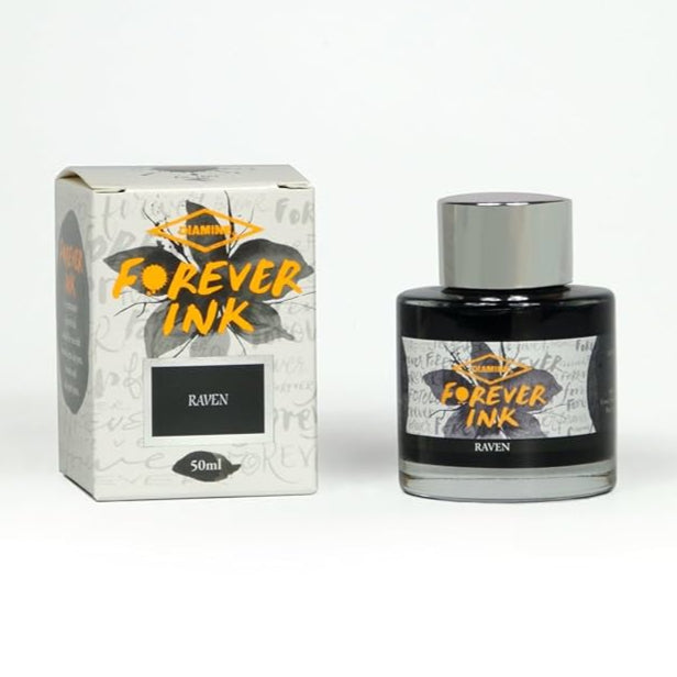 Bottle and box of 'Forever Ink' Raven on a white background