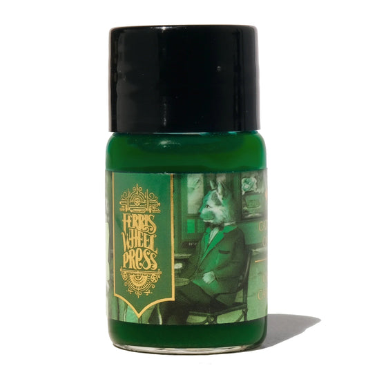 Green bottle with black cap on a white background