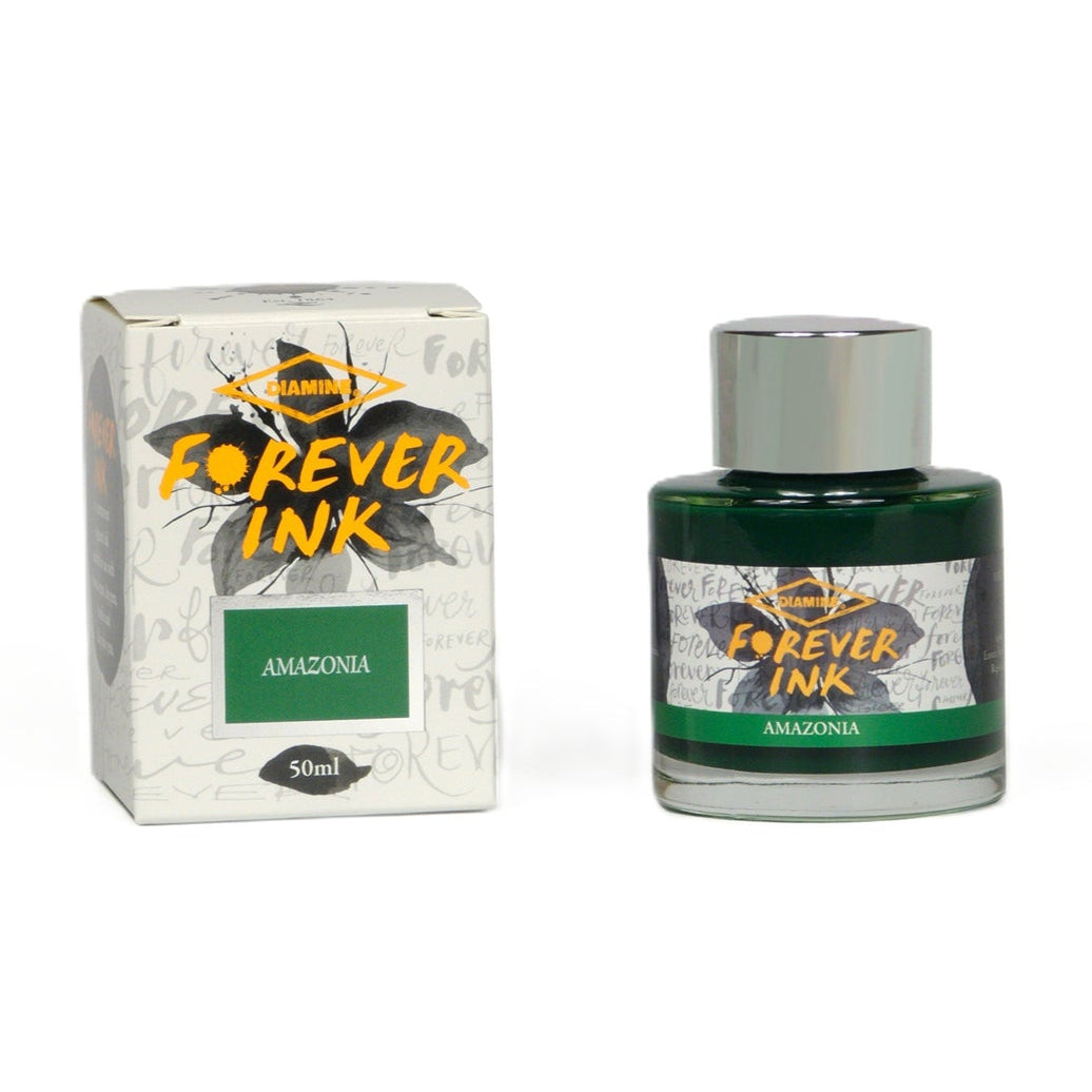 Bottle and box of 'Forever Ink' Amazónica on a white background