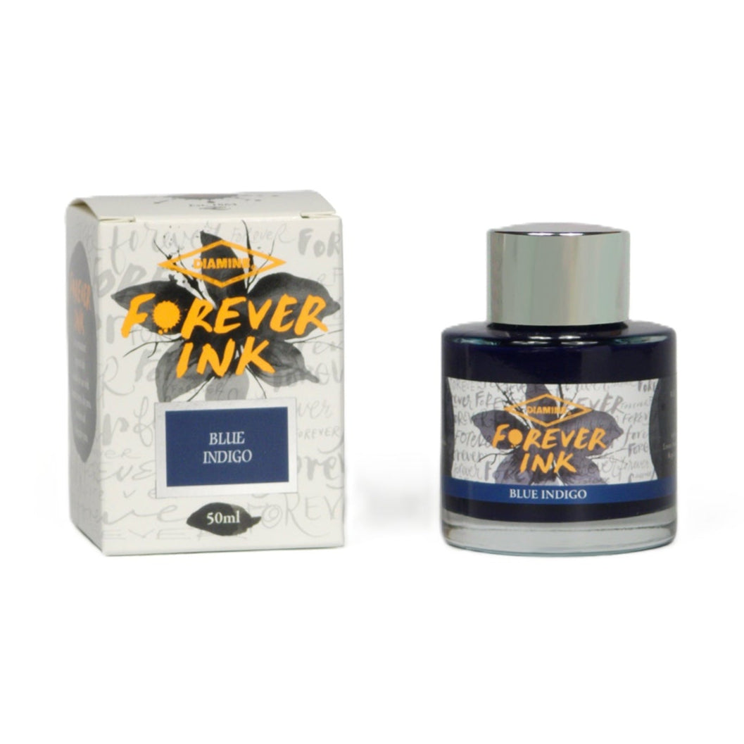 Bottle and box of Forever Ink Blue Indigo on a white background