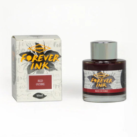 Bottle and box of Forever Ink Red Ochre on a white background